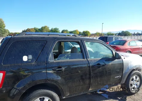 2009 Ford Escape Hybrid Limited z USA, uszkodzony, nr VIN 1FMCU49359KA88210